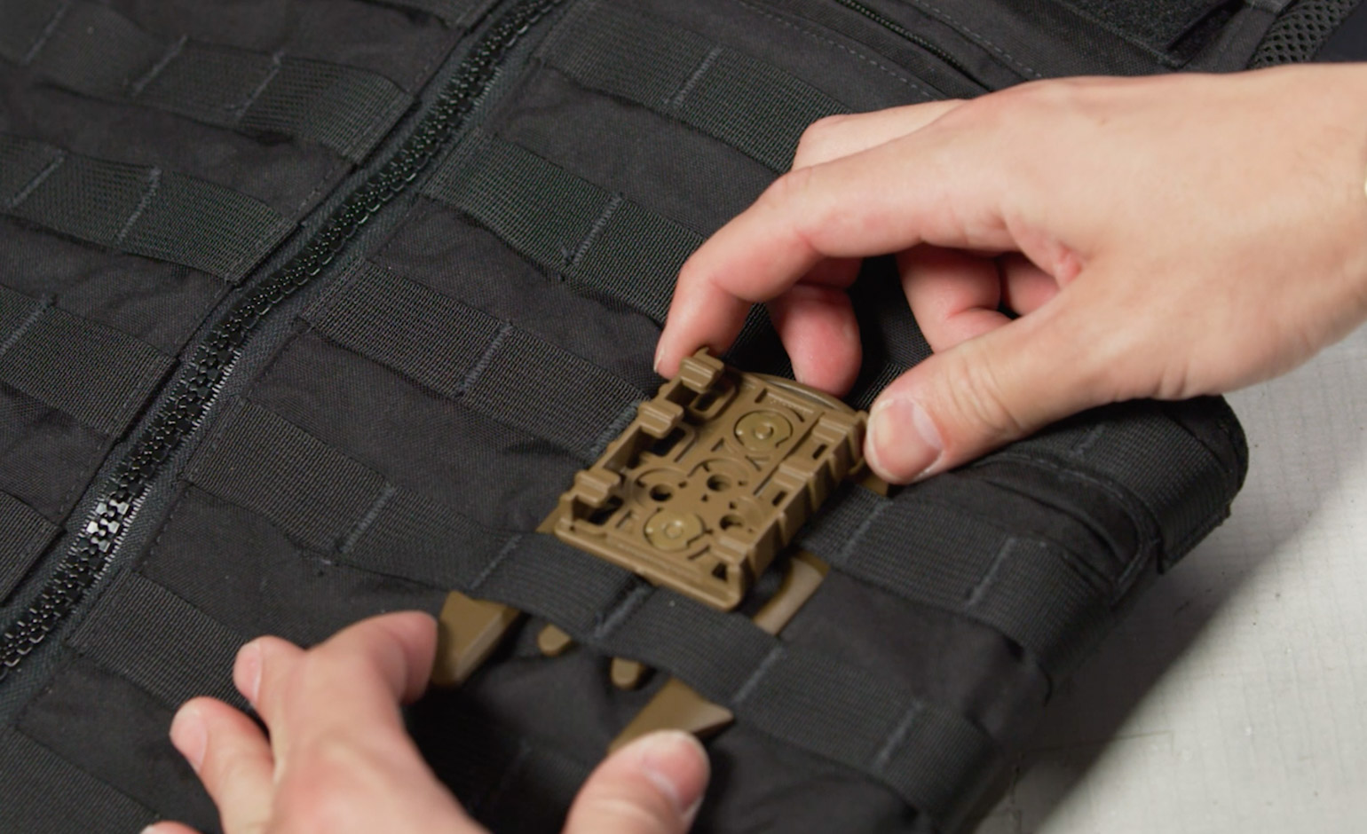 Safariland QLS 19, QLS22, and Hardware MLS gives officers the ability to  quickly and easily mount almost any Safariland duty gear to a MOLLE  equipped vest, drop belt, duty belt or even