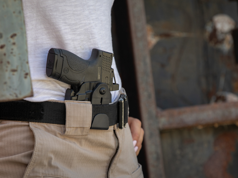 Woman wearing a Safariland 575 GLS IWB holster