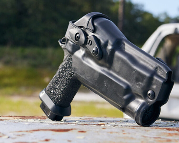 Staccato handgun in holster at the range