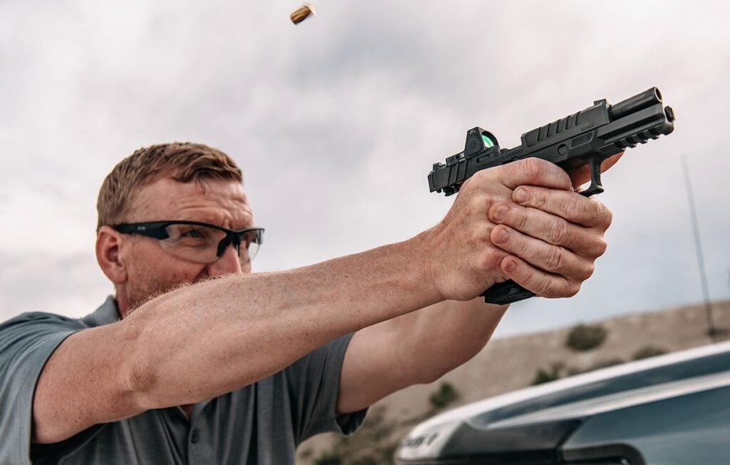 Man firing Springfield Armory Echelon pistol