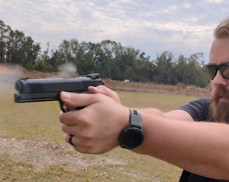 man shooting m1911