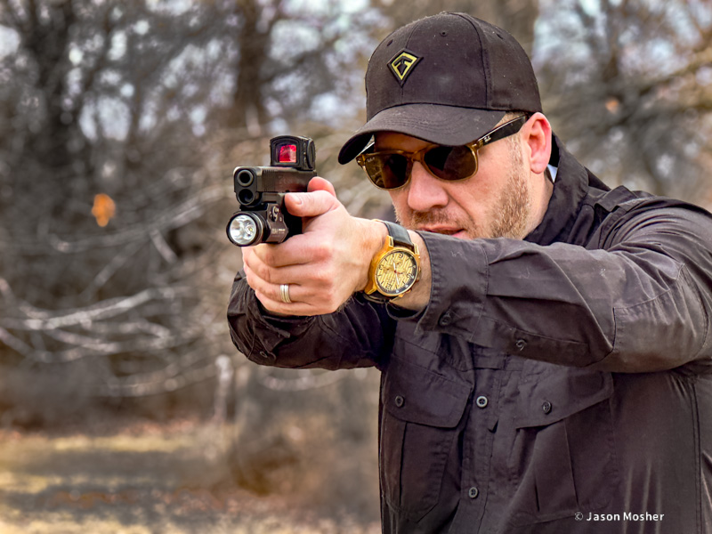 Jason Mosher shooting a Glock 49 with Aimpoint ACRO P-2 red dot