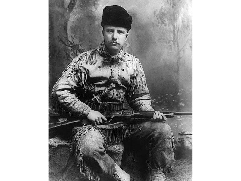 Theodore Roosevelt with his engraved Model 1876.