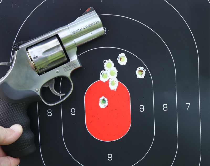 2.5 inch snub nose revolver on target showing 7-round shot group