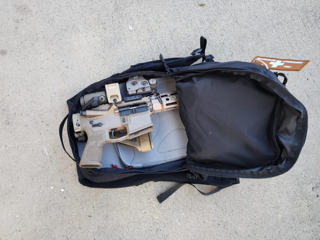 Rifle inside an off body carry bag.