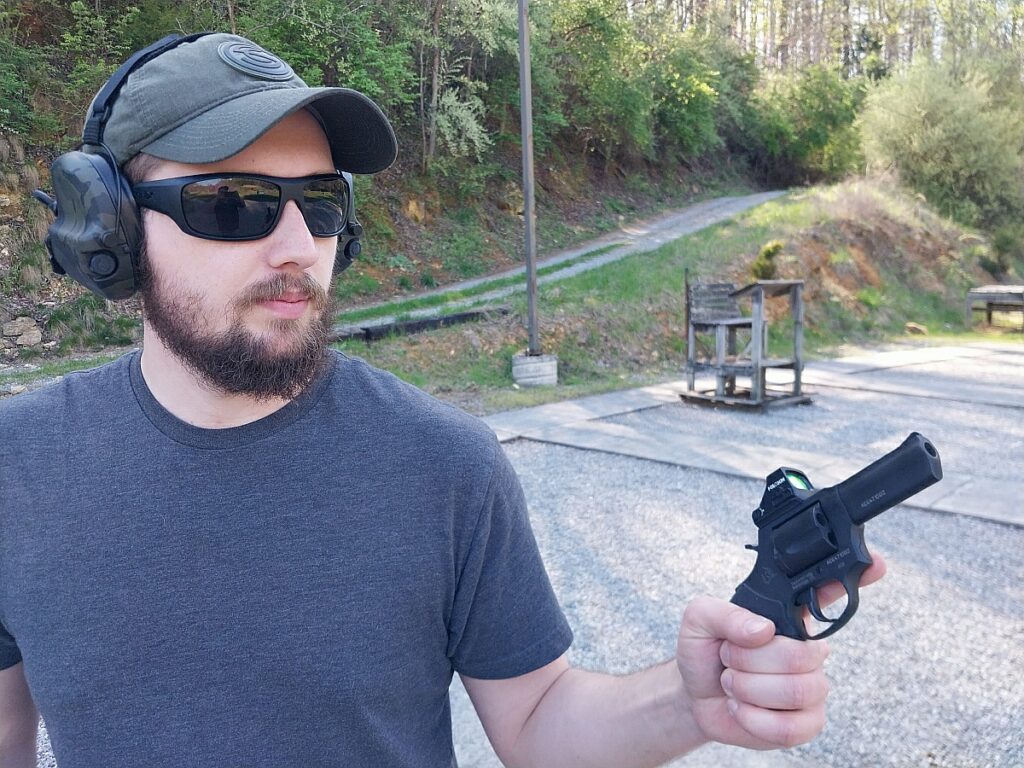 Man holding a revolver