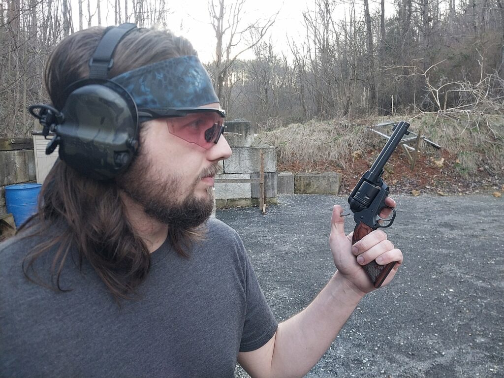 Man holding a Ruger Wrangler revolver