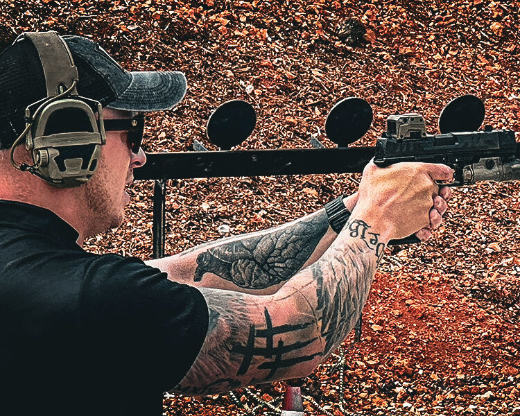 Rick Crawly shooting on the range.