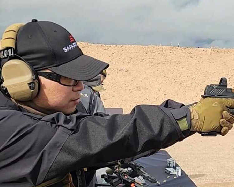 Safariland 2024 father's day gift guide feature image - a dad shooting at range with Safariland gear