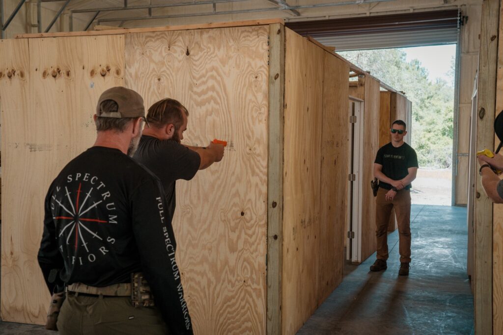 Pieing around corner - room clearing drill at Full Spectrum Warrior indoor shoot house