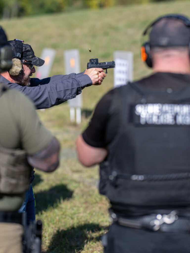 this image shows Rick Hogg conducting a live fire demo for students