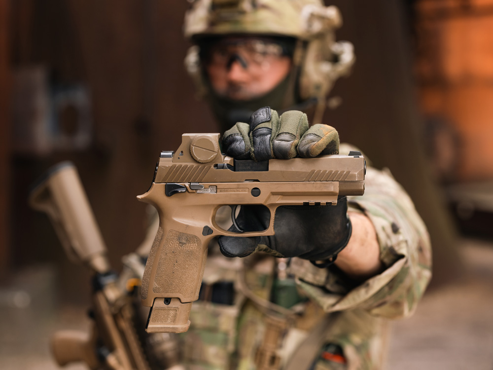 soldier with sig pistol