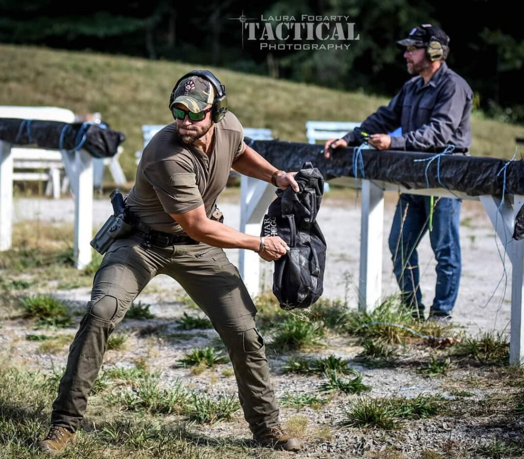 this picture depicts a law enforcement officer throwing a sandbag during the shooting under physical duress drill