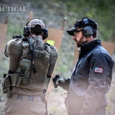Rick Hogg with a law enforcement officer shooting the War HOGG Self Eval