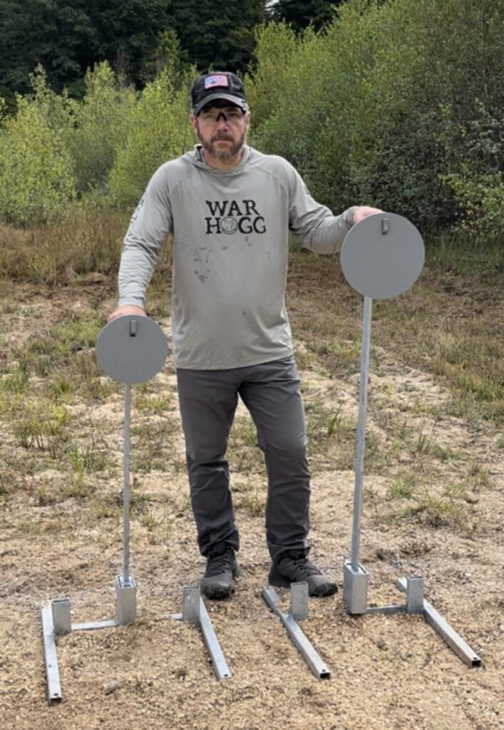 Rick Hogg stand next to an alternative War HOGG Self Eval using Grizzly Targets