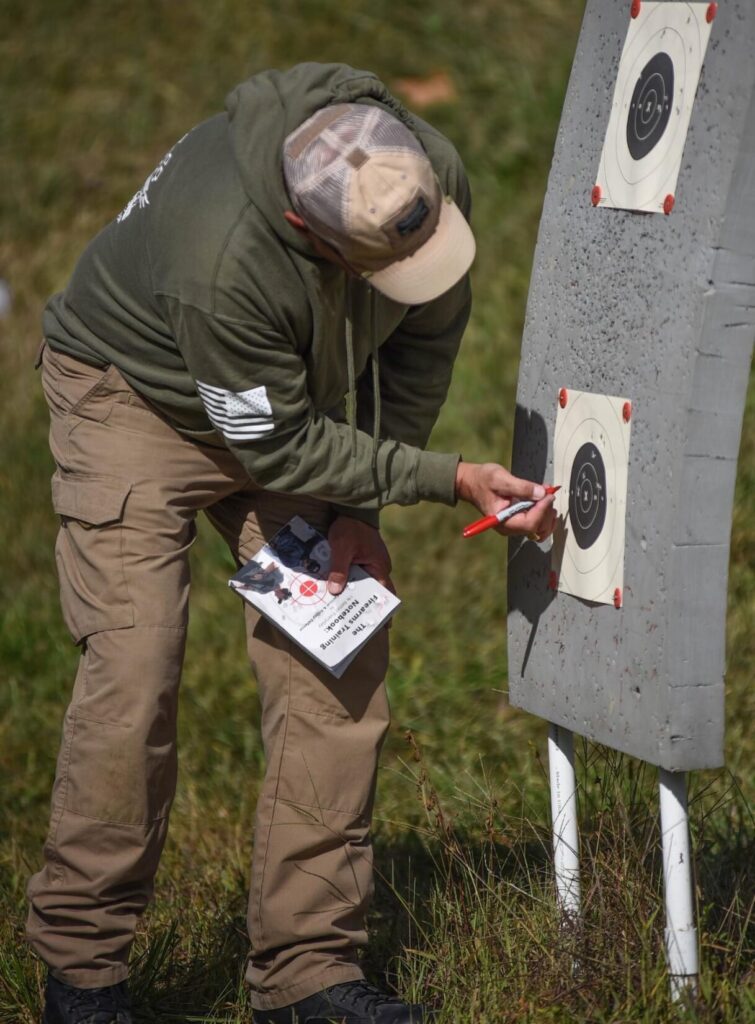 Sheriff kenny freeman collecting data from a b8 target