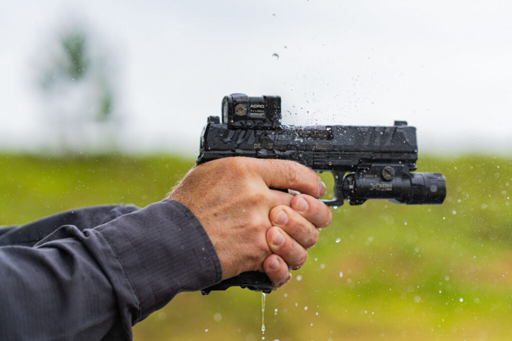 Rick Hogg shooting an Aimpoint ACRO P2 in the rain 