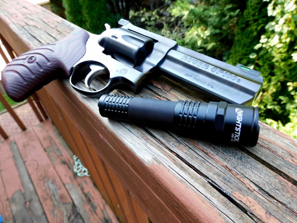 Nightstick USB-320 EDC light with a Ruger GP100 revolver