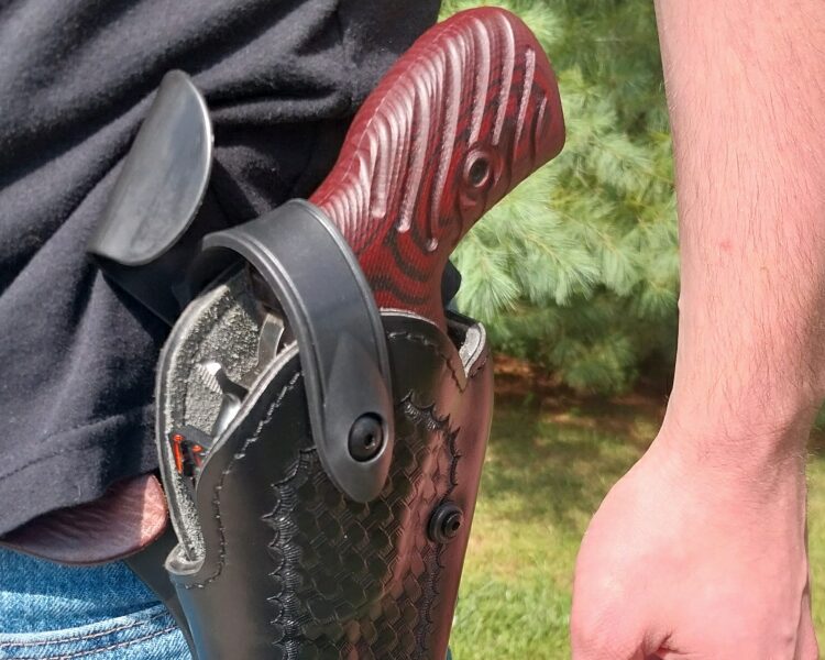 Open carried revolver in Safariland holster