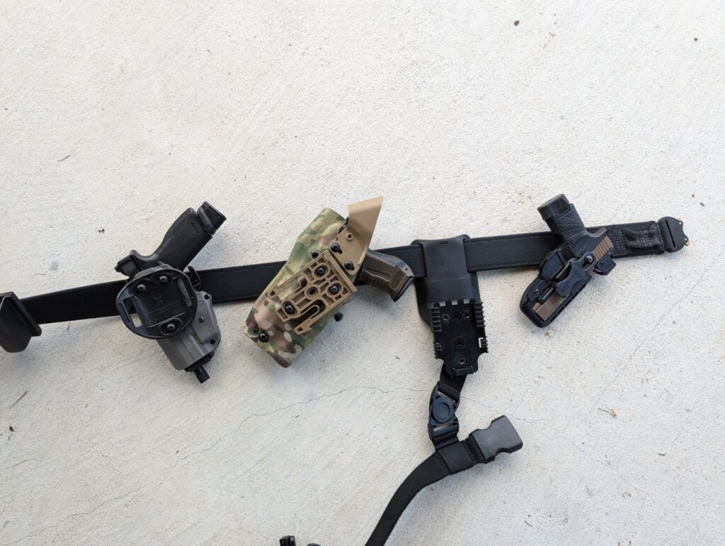 guns and holsters on safariland battle belt