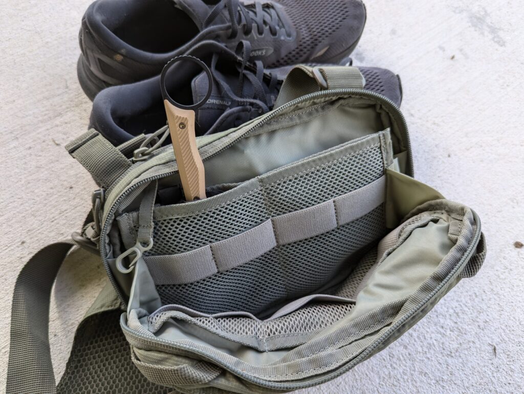 Front pouch with knife