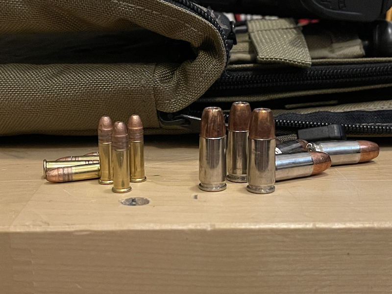 View of .22lr ammunition and 9mm ammunition next side by side