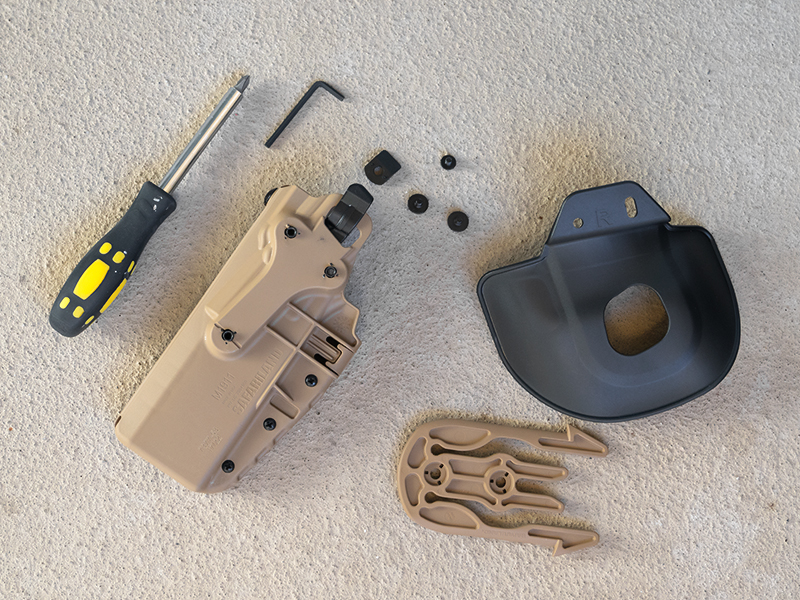 Safariland holster, QLS receiver, and paddle attachment