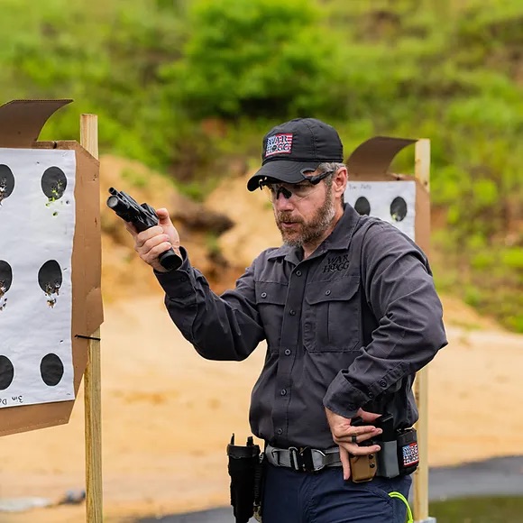 Rick Hogg of War HOGG Tactical demonstrates the "Center Line Sweep" and support hand placement during a training course 