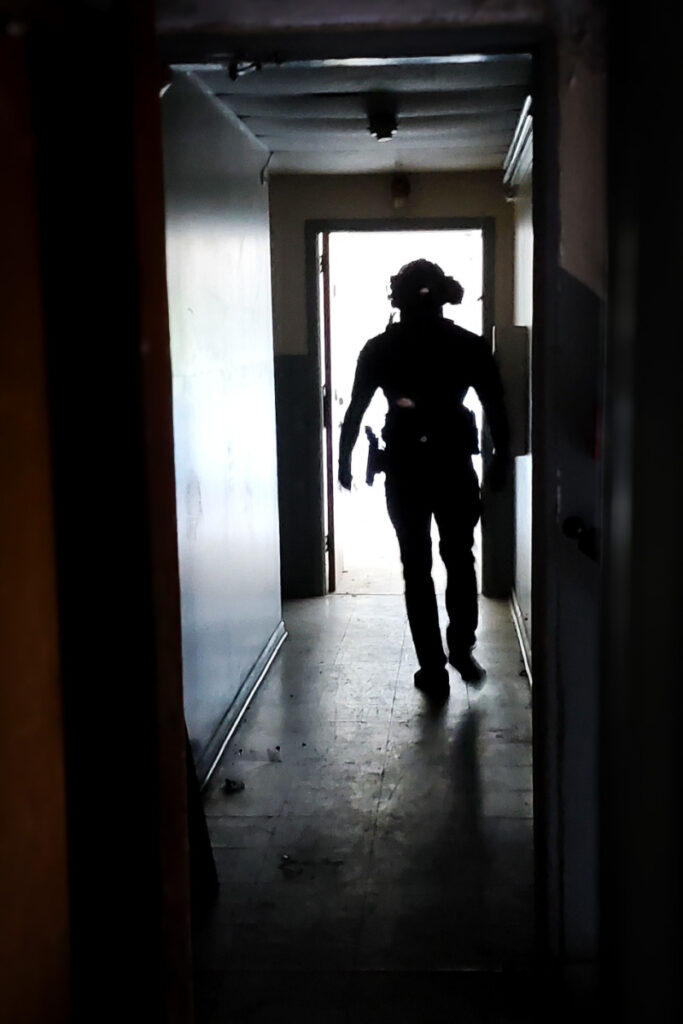 silhouette of Blake Cook in full kit, lead instructor and Director of Law Enforcement Operations at Blu Bearing Solutions.