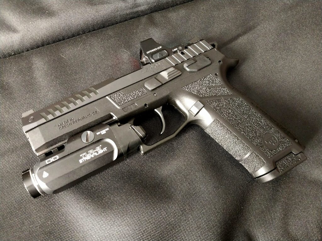 P-09 grip features with weapon light and optic