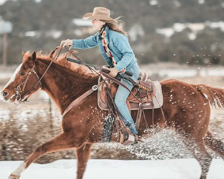 Henry LASR lever action rifle - carried by cowgirl on horse