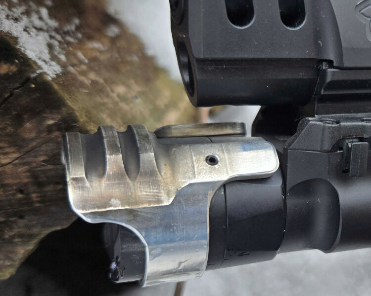 Dark Matter CMD on Surefire weaponlight mounted to a Walther handgun