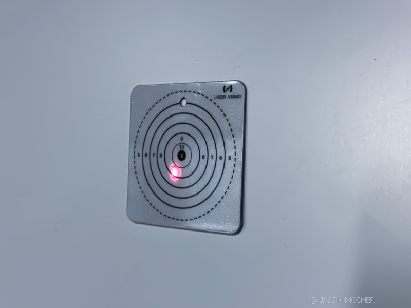 Training at home with Laser Ammo Training Technologies target on wall