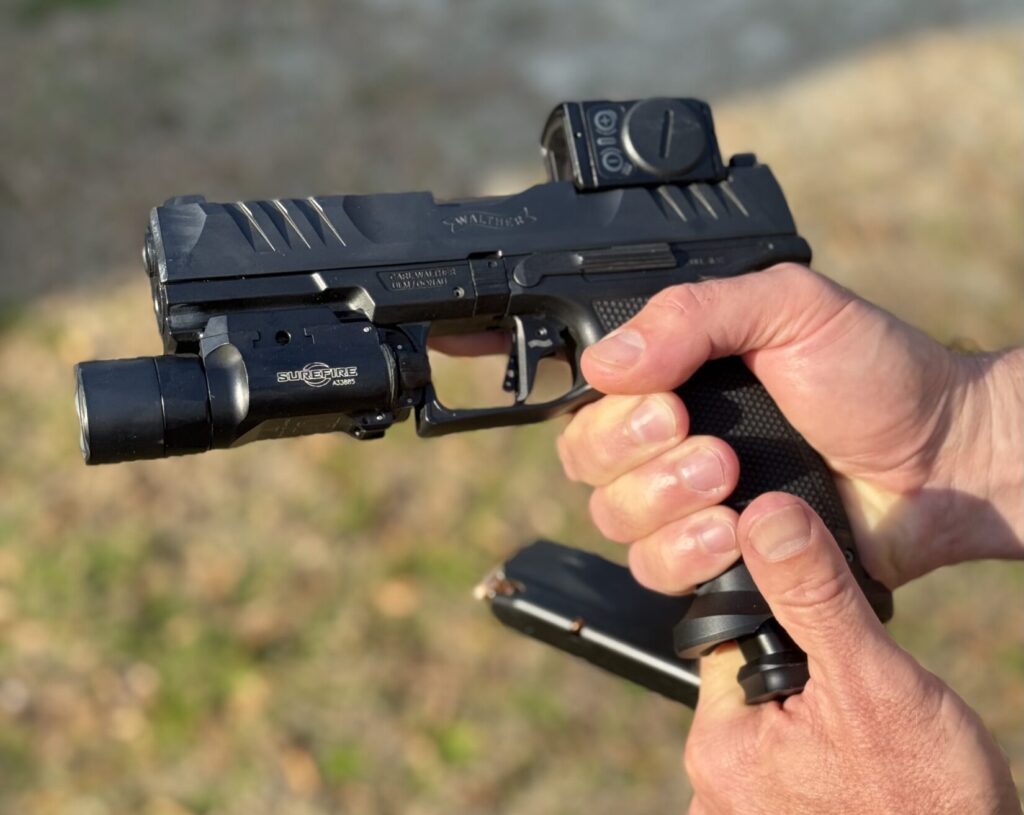 Rick Hogg demonstrates the lobster claw technique while conducting the tactical magazine change