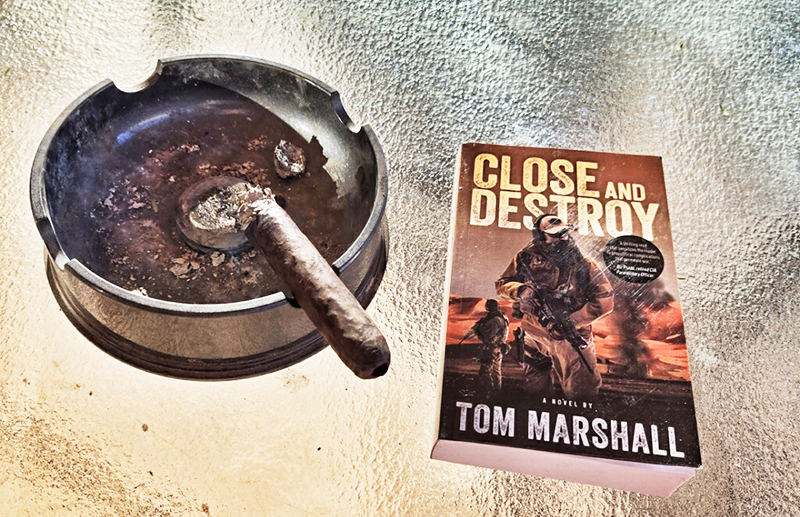 Tom Marshall's Close and Destroy novel next to cigar and ashtray