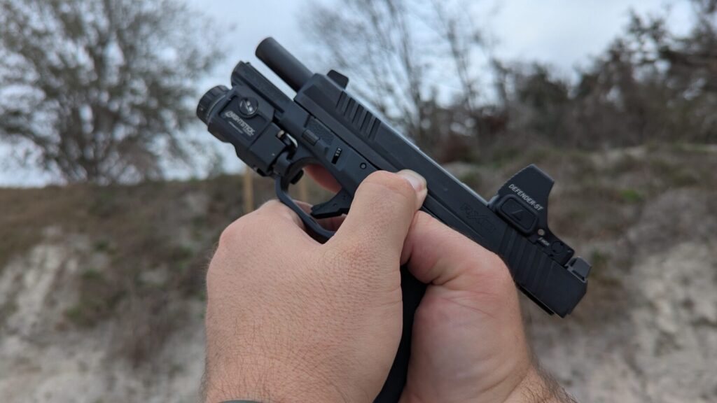 dropping the slide on a semiautomatic pistol