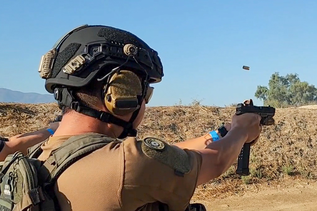 Firing the MR918 with an extended magazine, showing controlled recoil at a fast cadence