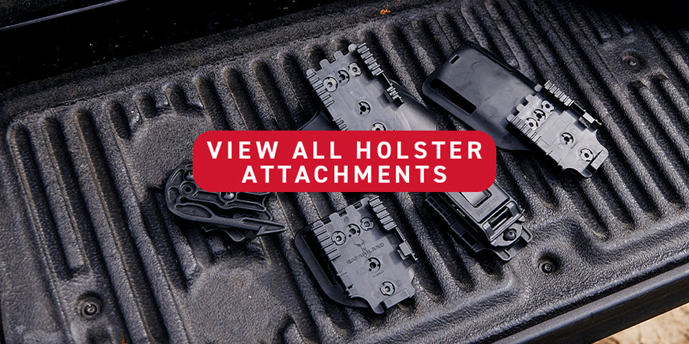 A lowered truck bed displaying several different Safariland holster attachments and accessories. 
