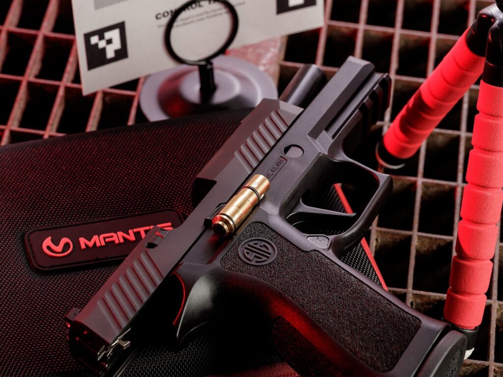 Sig Sauer handgun with Mantis dry fire training tools