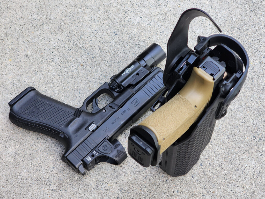 A Shadow Systems MR918 fitted with the Afterburner + Ramjet, holstered in a Safariland 7TS holster for the Glock 17