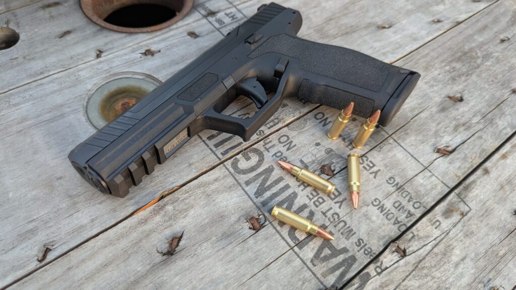 5.7 rounds next to handgun