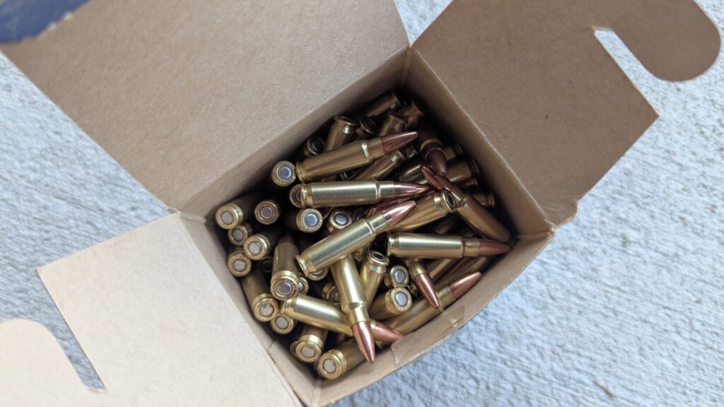 5.7mm rounds inside a cardboard box