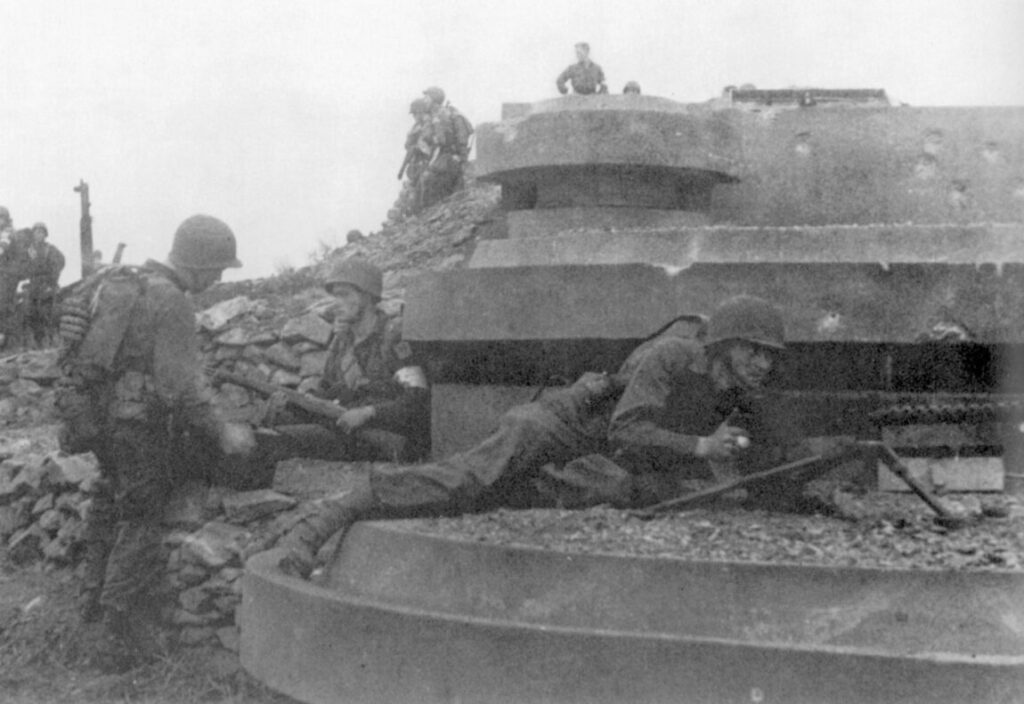 Soldiers of the 1st Ranger Battalion secure a captured gun position in Algeria, following their successful assault on two strategic forts overlooking the Arzew harbor—an operation that paved the way for the Allied invasion of French North Africa. (Photo: U,S. Army)