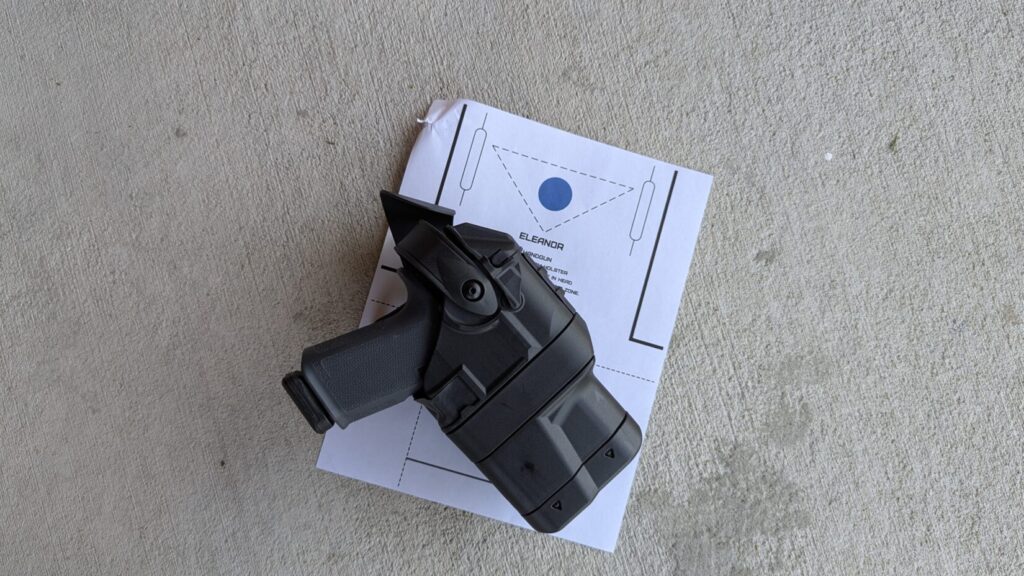 Eleanor target and handgun in Safariland Ballast holster