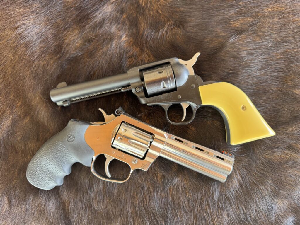 (TOP) Ruger Wrangler, (bottom) Colt King Cobra.