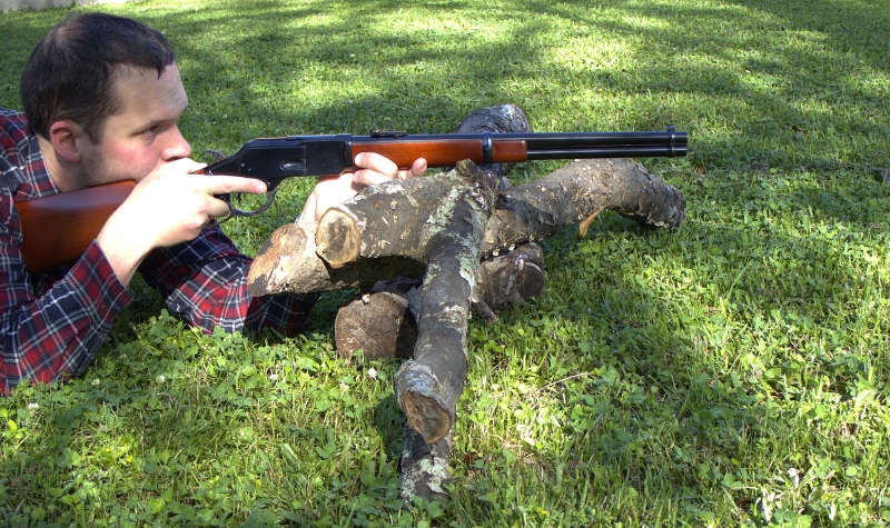 man shooting the 1873 winchester