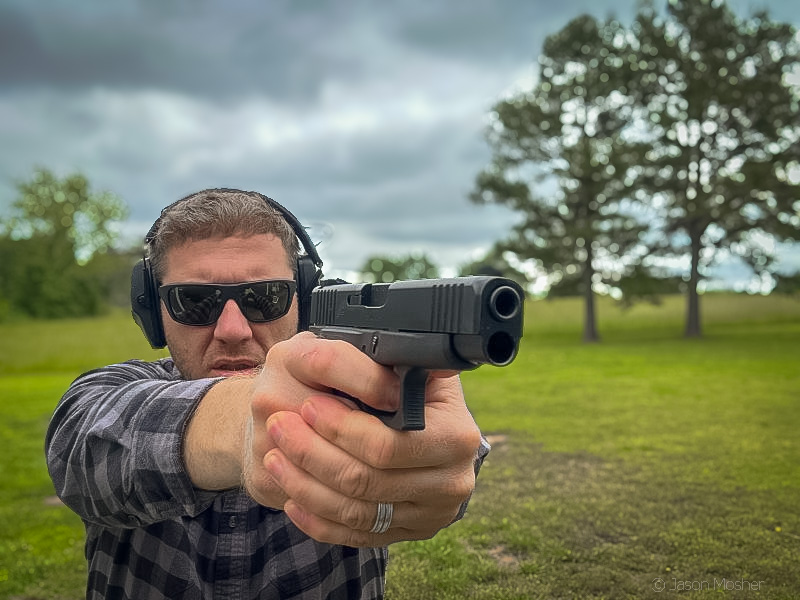man shooting the Glock 48. 