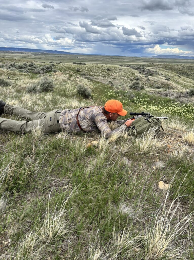 Shooting a TC off of a pack in the grasslands