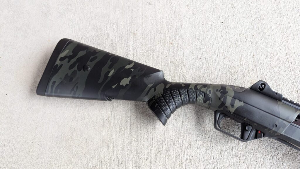 view of half of the Nova 3 shotgun, from stock to trigger and beginning of Picatinny rail.