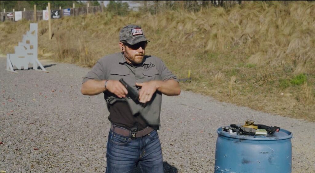 In this photo Rick Hogg from War HOGG Tactical is demonstrating the pistol presentation from concealment